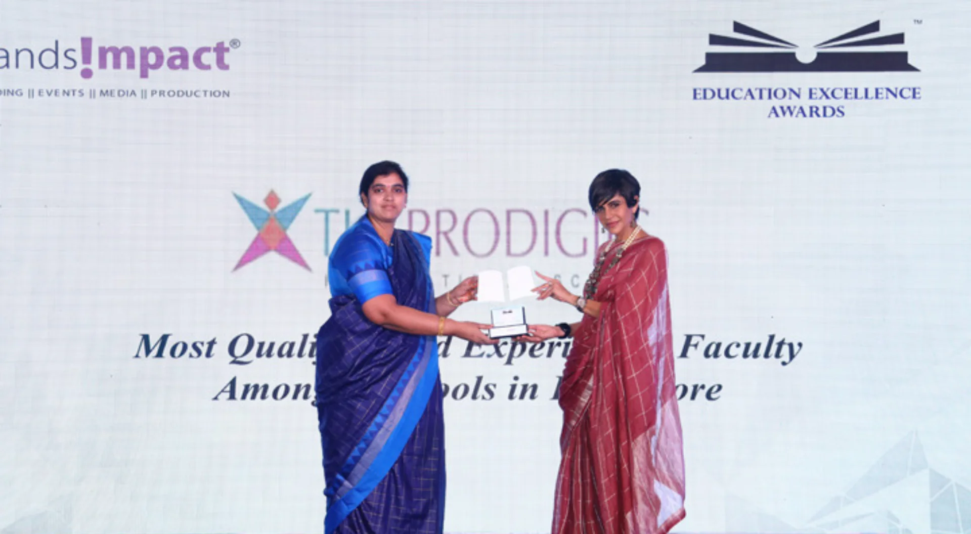 Award given By Mandira Bedi at Brands Impact Awards Ceremony
